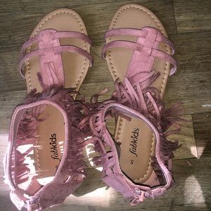 Pink sandals with tassels